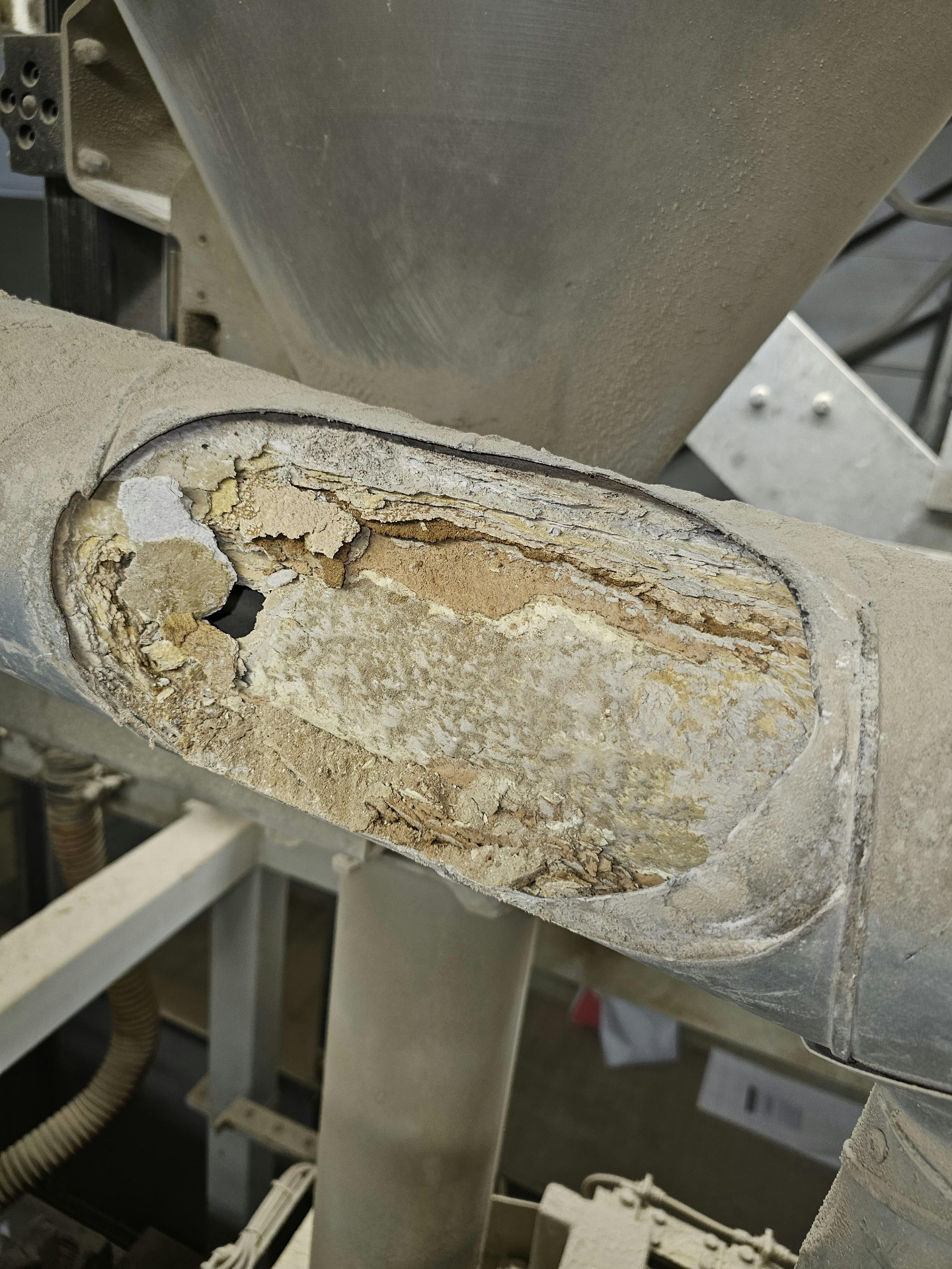 Heavily blocked LEV ductwork at a UK manufacturing facility cleared by Deduct Ltd